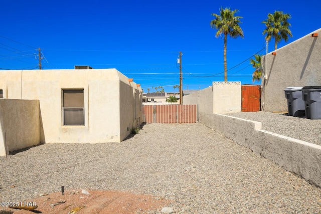 view of yard featuring a gate and fence