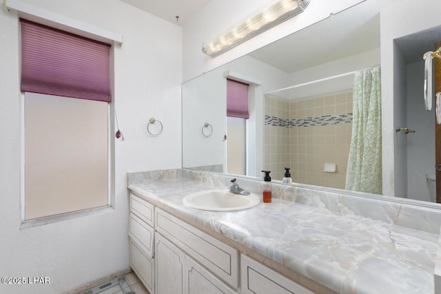 full bath with vanity and a shower with shower curtain