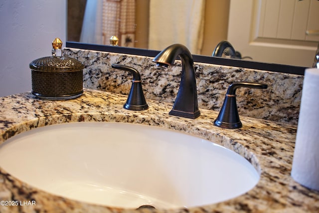 interior details with backsplash and vanity