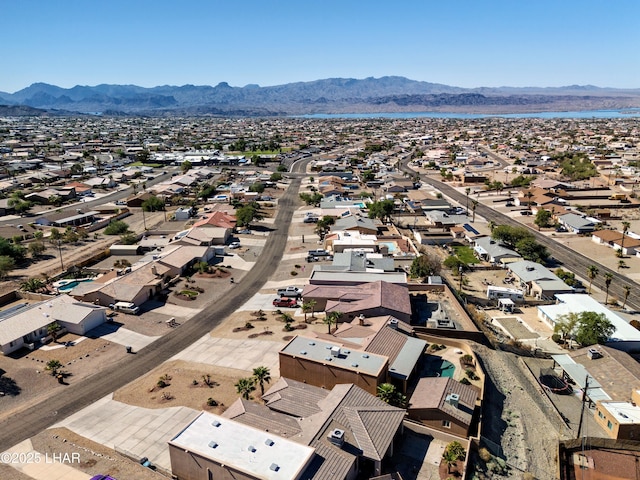 birds eye view of property with a residential view and a mountain view