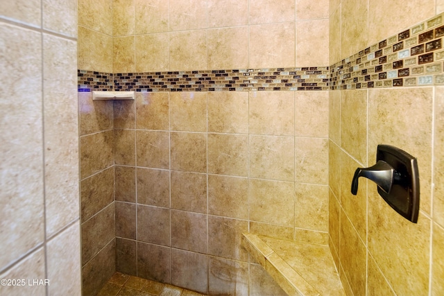 details featuring a tile shower