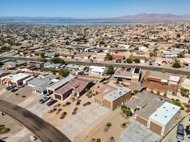 bird's eye view featuring a residential view and a mountain view