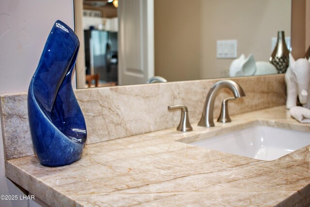 interior details featuring tasteful backsplash and vanity