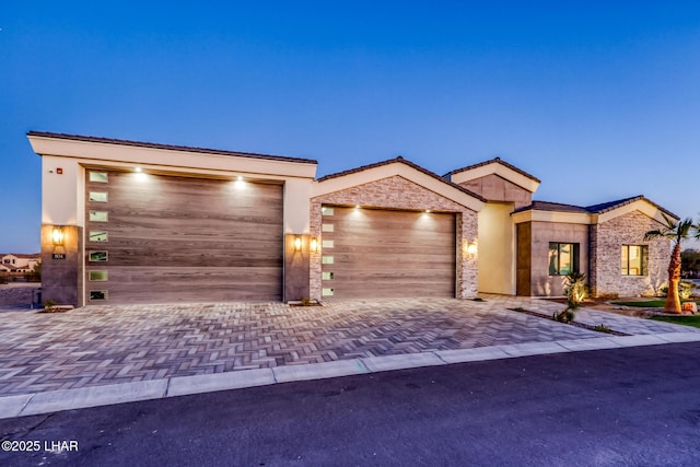 view of front of home with a garage