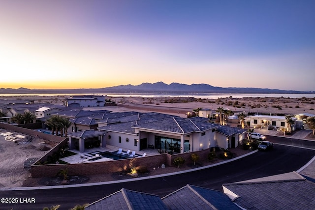 aerial view at dusk with a mountain view