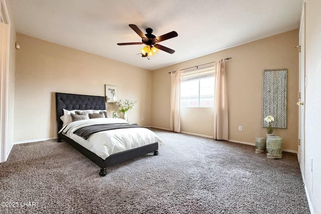 carpeted bedroom featuring baseboards and a ceiling fan