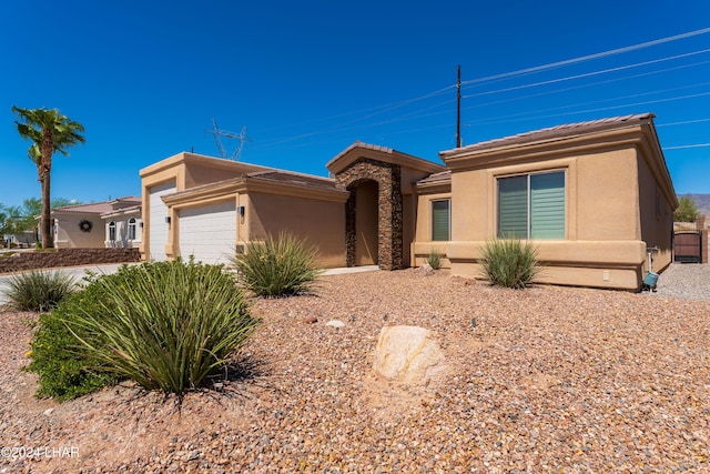 view of front of home with a garage