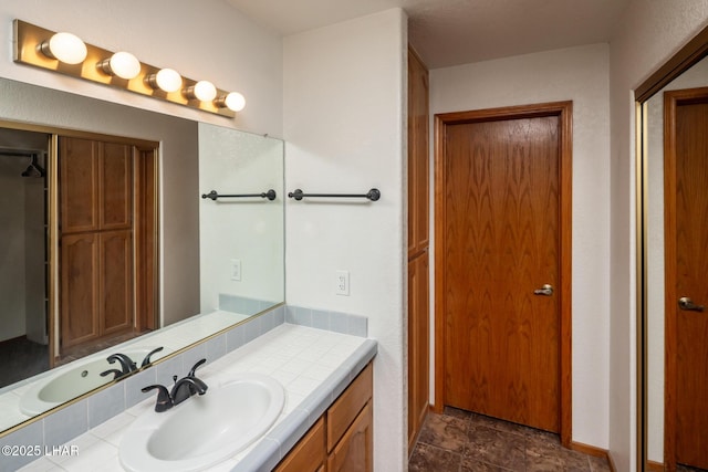 2130 Smoketree Ave N, Lake Havasu City, AZ 86403 - bathroom featuring a closet and vanity