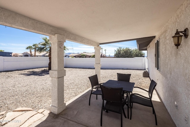 2130 Smoketree Ave N, Lake Havasu City, AZ 86403 - view of patio featuring a fenced backyard and outdoor dining area