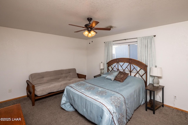 2130 Smoketree Ave N, Lake Havasu City, AZ 86403 - bedroom with carpet, baseboards, a textured ceiling, ceiling fan, and visible vents