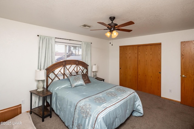 2130 Smoketree Ave N, Lake Havasu City, AZ 86403 - carpeted bedroom featuring a textured ceiling, a closet, ceiling fan, and visible vents