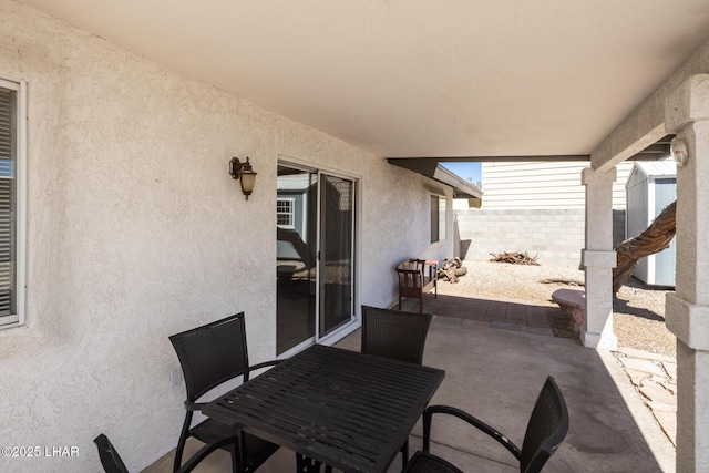 2130 Smoketree Ave N, Lake Havasu City, AZ 86403 - view of patio / terrace with fence and outdoor dining space
