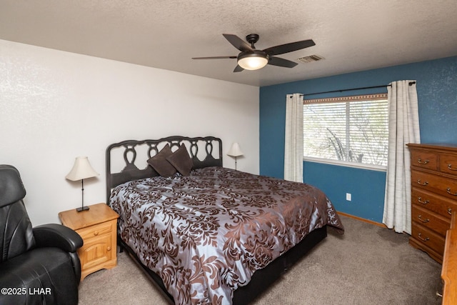 2130 Smoketree Ave N, Lake Havasu City, AZ 86403 - bedroom with carpet floors, a textured ceiling, visible vents, and a ceiling fan