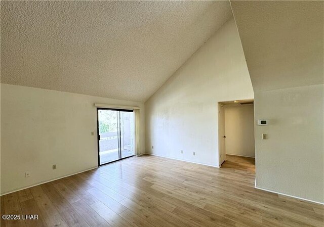 empty room featuring ceiling fan, carpet flooring, and a textured ceiling