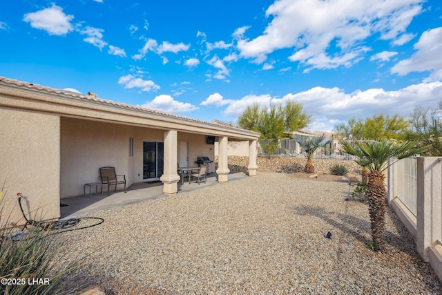 view of yard featuring a patio area and a fenced backyard