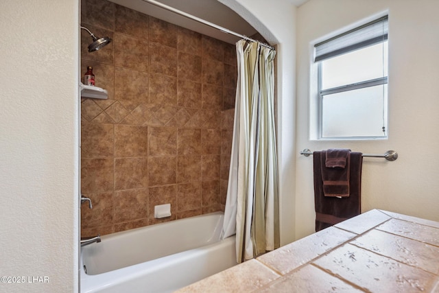 full bathroom featuring shower / bath combination with curtain