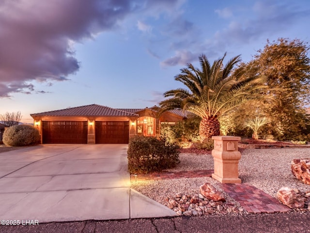 view of front of home with a garage