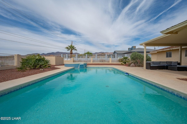 view of pool with an outdoor hangout area, a fenced in pool, a fenced backyard, and a patio area