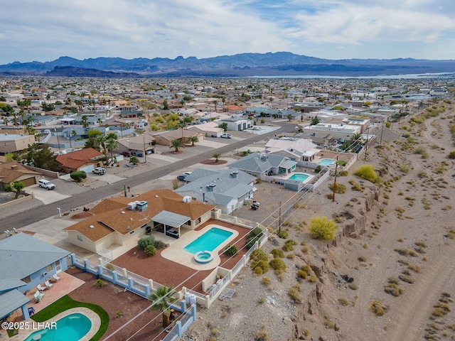 drone / aerial view with a mountain view and a residential view