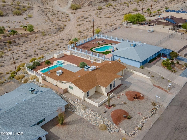 drone / aerial view with a desert view