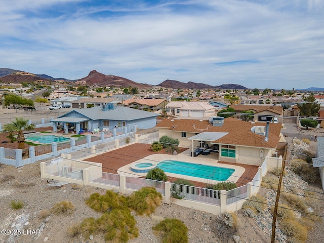 exterior space featuring a residential view and a mountain view