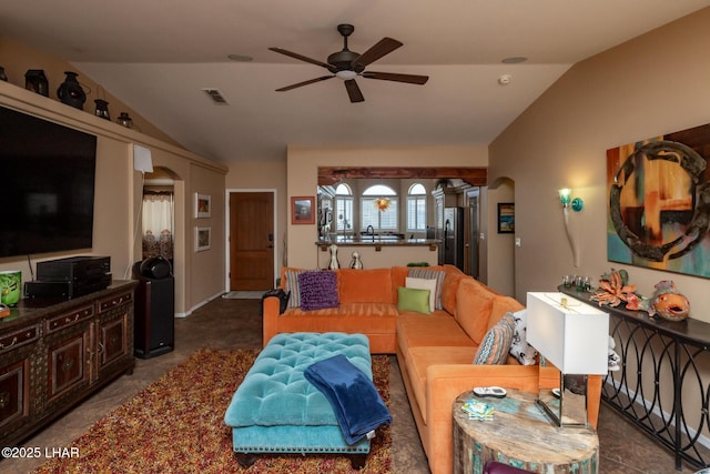 living area featuring arched walkways, lofted ceiling, visible vents, and ceiling fan