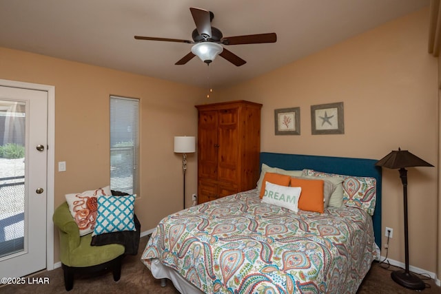 carpeted bedroom with baseboards and ceiling fan