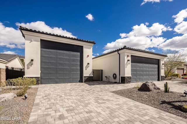 garage featuring fence