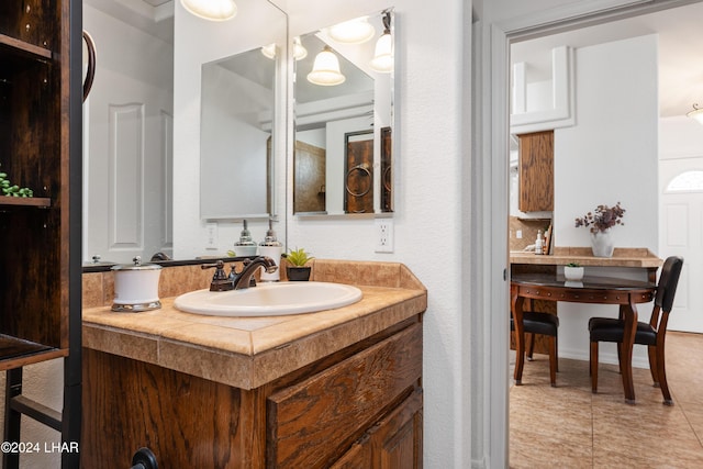 bathroom with vanity and tile patterned floors