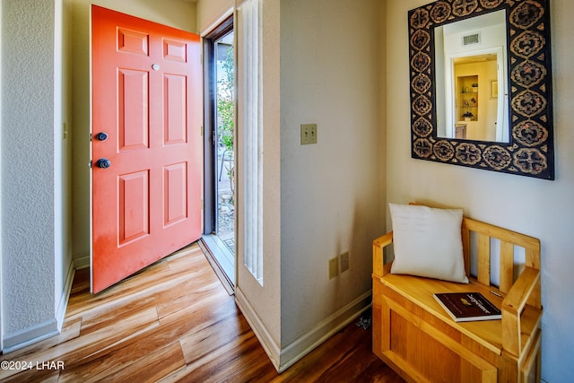 entryway with wood-type flooring