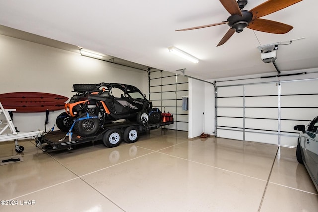 garage with ceiling fan and a garage door opener