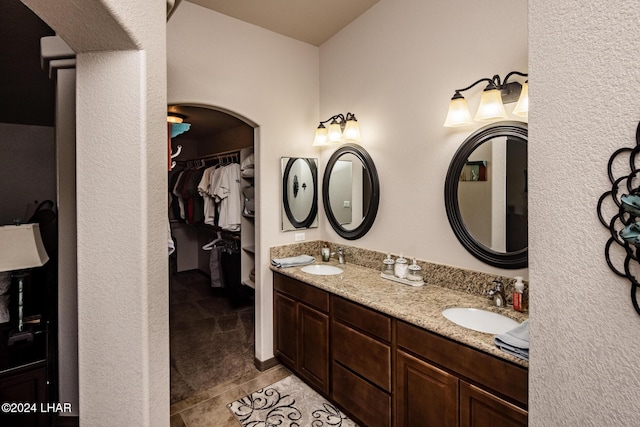 bathroom with vanity and tile patterned flooring