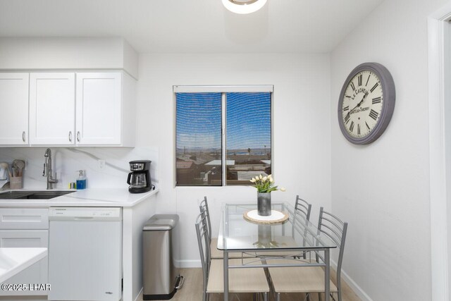 2100 Swanson Ave Unit 209, Lake Havasu City, AZ 86403 - dining space with baseboards and wood finished floors