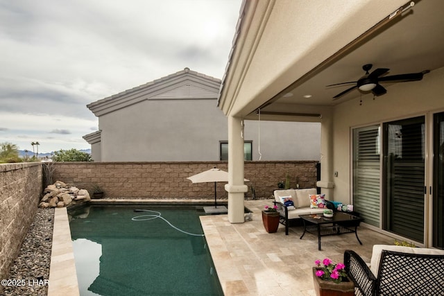 607 Veneto Loop, Lake Havasu City, AZ 86403 - view of patio / terrace featuring ceiling fan, an outdoor hangout area, and a fenced backyard