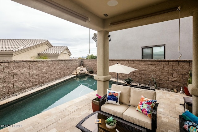 607 Veneto Loop, Lake Havasu City, AZ 86403 - view of swimming pool featuring outdoor lounge area, a fenced backyard, and a patio area