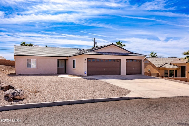 ranch-style home with a garage