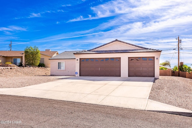 ranch-style house with a garage