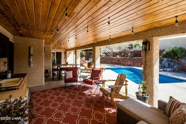 exterior space featuring sink and a patio area