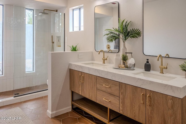 1364 Candy Dr, Lake Havasu City, AZ 86404 - bathroom with a sink, a tile shower, and tile patterned flooring