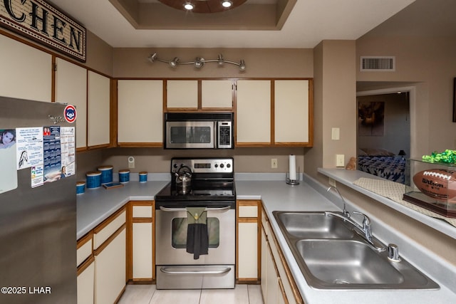 1650 Smoketree Ave S Unit 175, Lake Havasu City, AZ 86403 - kitchen featuring visible vents, light countertops, a sink, and appliances with stainless steel finishes