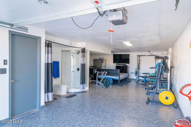 interior space featuring baseboards and a garage door opener