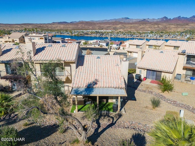 bird's eye view featuring a residential view and a mountain view