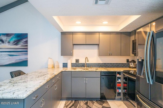 kitchen with range with electric cooktop, a sink, visible vents, gray cabinets, and stainless steel fridge with ice dispenser