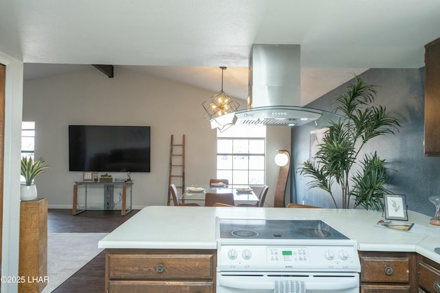 kitchen with island exhaust hood, light countertops, electric range, lofted ceiling with beams, and wood finished floors