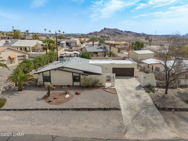 birds eye view of property featuring a residential view and a mountain view