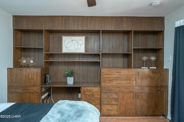 bedroom with wood finished floors