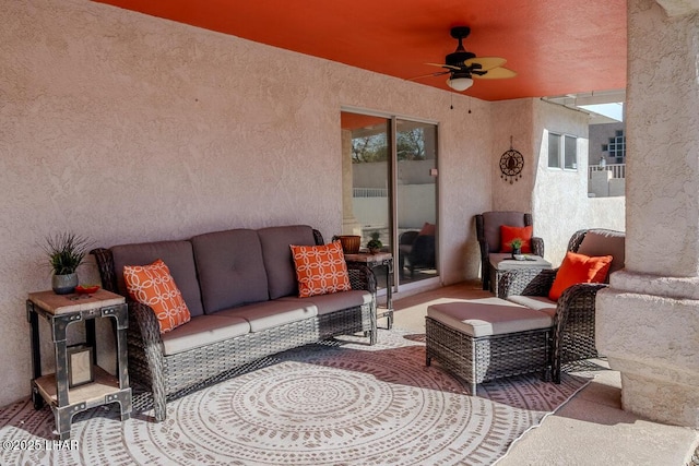 view of patio with ceiling fan and an outdoor hangout area