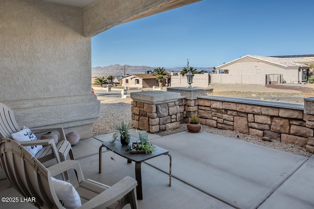 view of patio with fence