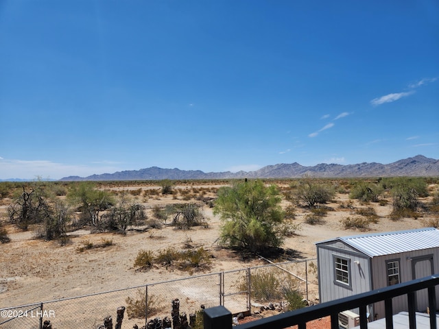 mountain view featuring view of desert