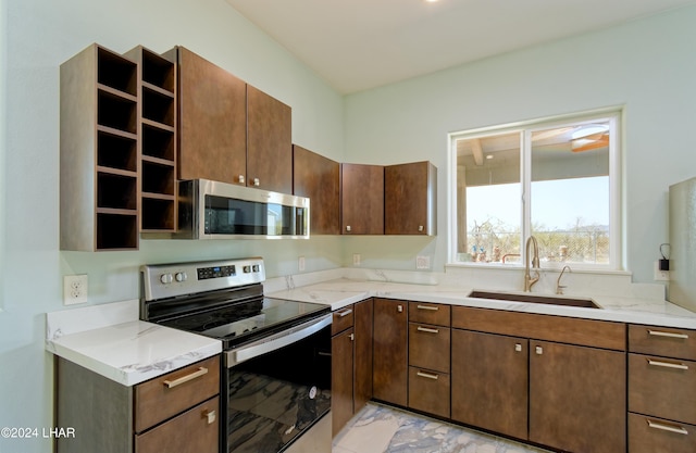 kitchen featuring a sink, light stone countertops, marble finish floor, stainless steel appliances, and open shelves